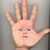Cara_en_la_mano
