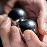 Man_holding_chinese_balls_0003