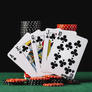 Casino-chips-stack-royal-flush-playing-card-green-poker-table_23-2147937910