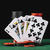 Casino-chips-stack-royal-flush-playing-card-green-poker-table_23-2147937910