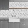 White_marble_thicker_herringbone_peel_and_stick_backsplash_tile