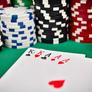 Depositphotos_81452434-stock-photo-full-house-and-poker-chips