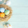 Happy-easter-day-easter-eggs-wooden-background_74952-2987