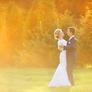 Young-wedding-couple-enjoying-romantic-moments-outside-in-summer-park-sbi-305129214